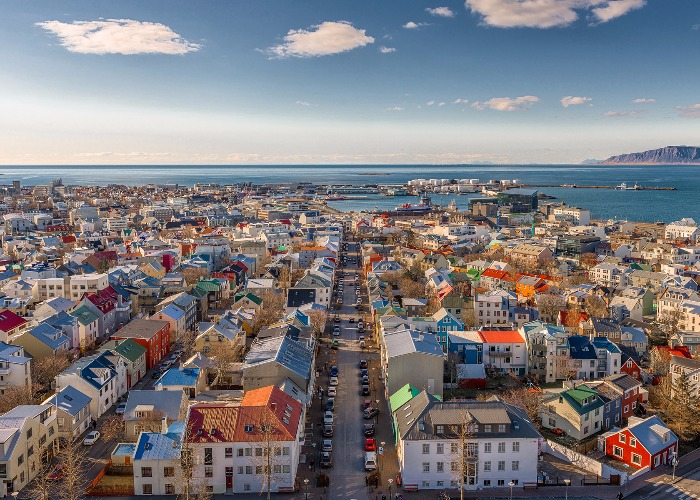 aerial view of the Capital, Reykjavik with ocean and mountains in distance